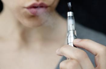Electronic Cigarette Use Promotes a Unique Periodontal Microbiome